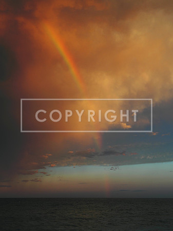 Sunrise Rainbow as a Storm moves over Lake Michigan