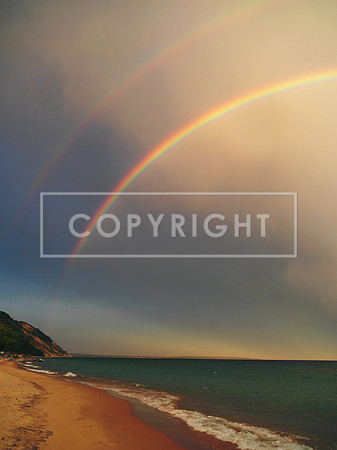 Sunrise Rainbow as a Storm moves over Lake Michigan