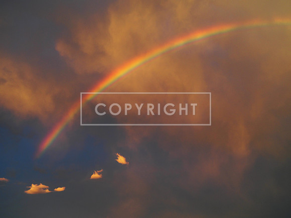 Sunrise Rainbow as a Storm moves over Lake Michigan