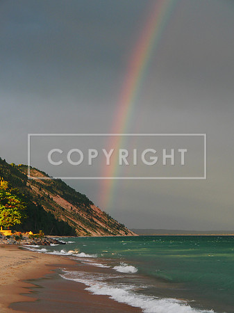 Sunrise Rainbow as a Storm moves over Lake Michigan